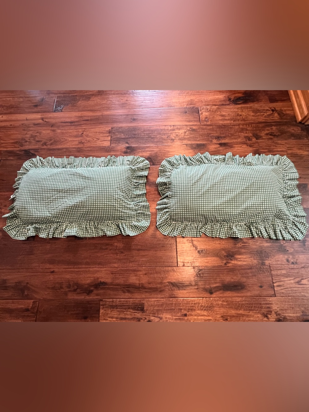 TWO KELLY GREEN AND WHITE GIGHAM CHECK RUFFLED PILLOW SHAMS. KING.